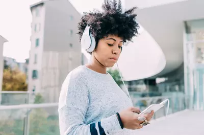 woman scrolling on phone