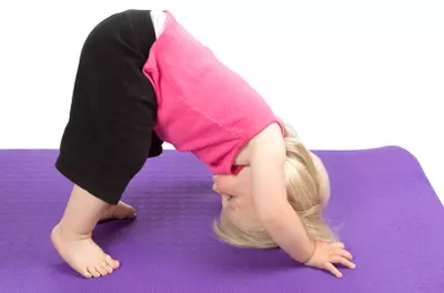 kid doing yoga