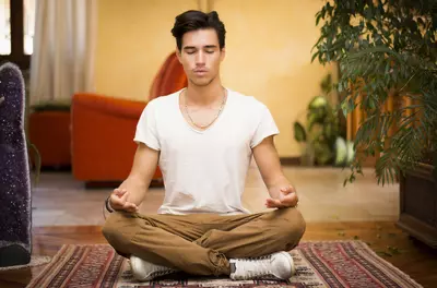 young guy meditating