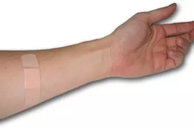 arm with bandaid on it