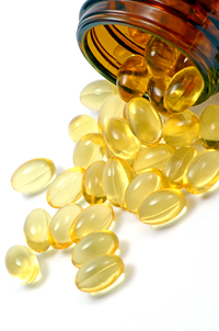 natural supplements, holistic medicine spilling out of jar