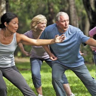 people doing qigong outside