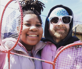 maya and sean playing badminton