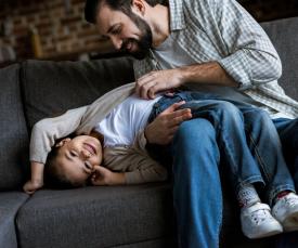 tickling on couch