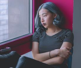 Woman sitting and posing