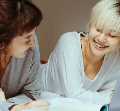 girls laughing together