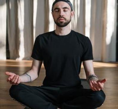 man practicing yoga