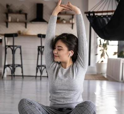 Women stretching at home