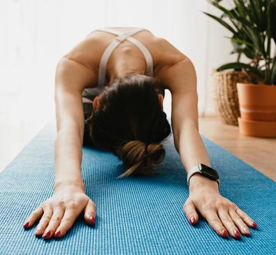 woman in extended child's pose