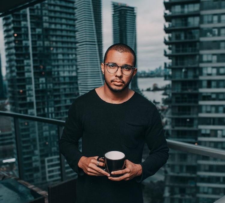 man holding coffee