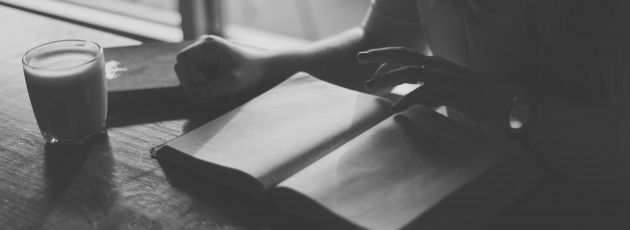 book on table Photo by Natalie Grainger on Unsplash