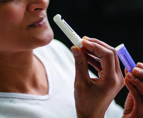 patient holding aromatherapy stick