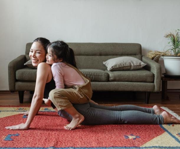 mother and child doing yoga