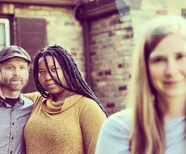 mixed race family with distressed facial expressions