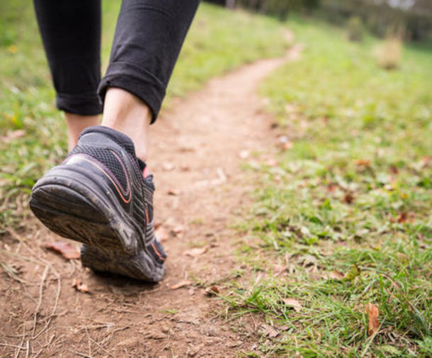 Woman walking on path